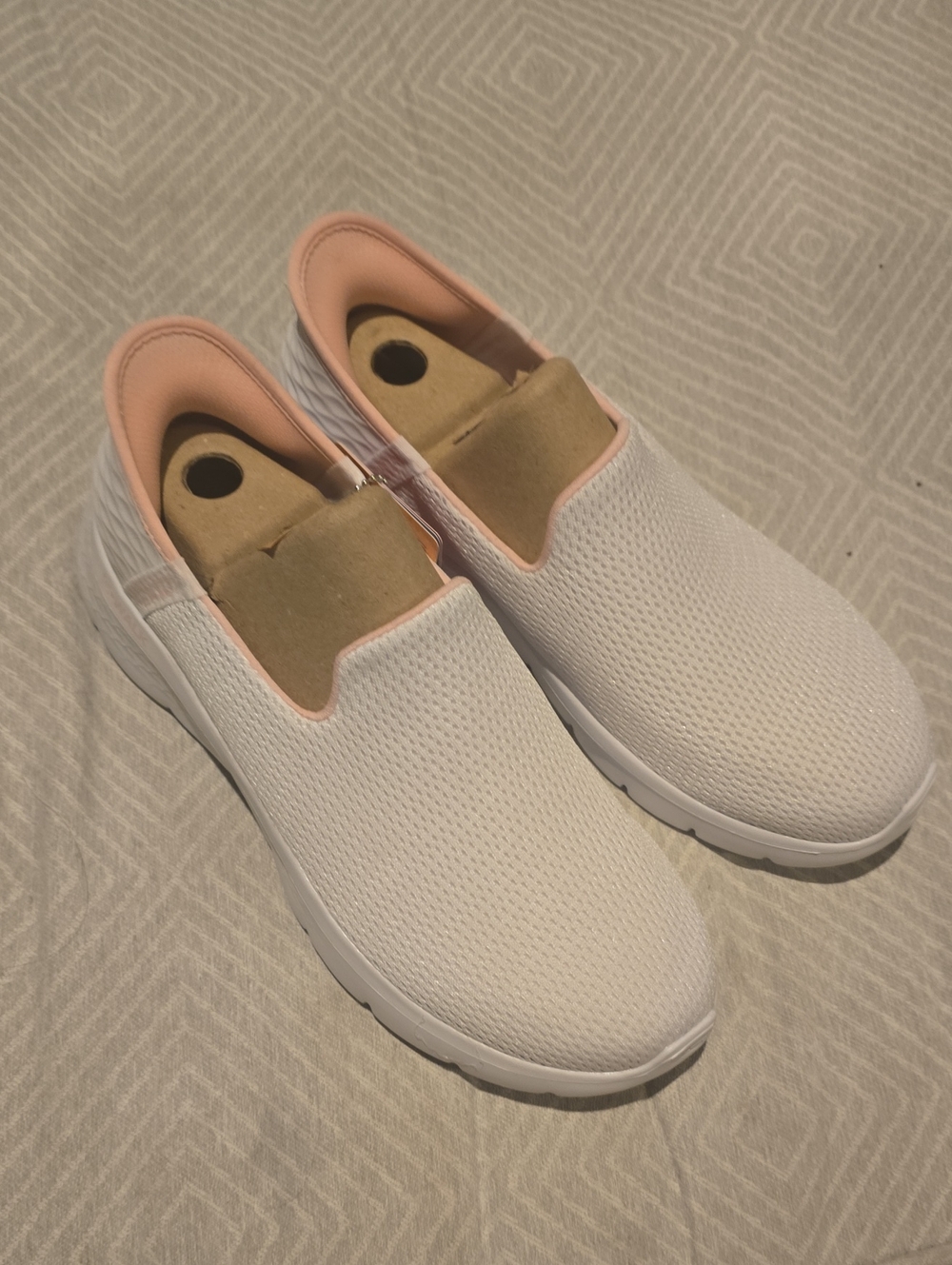Skechers White Slip-On Sneakers with Pink Lining